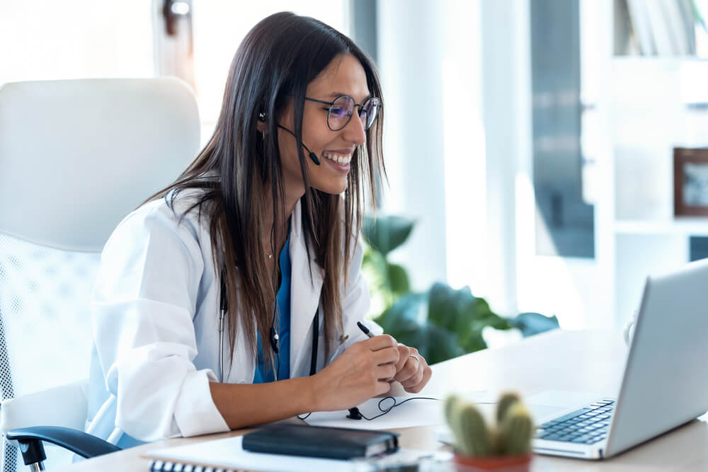 Female Doctor Talking With Colleagues Through a Video Call
